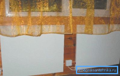 Аматьорски снимки, електрически нагреватели, направени под формата на панели с керамични вложки Аматьорски снимки, електрически нагреватели, направени под формата на панели с керамични вложки
